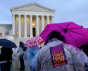 Student debt relief advocates gather outside the Supreme Court on Feb. 27 ahead of arguments over President Biden's student debt relief plan. (Patrick Semansky / Associated Press)